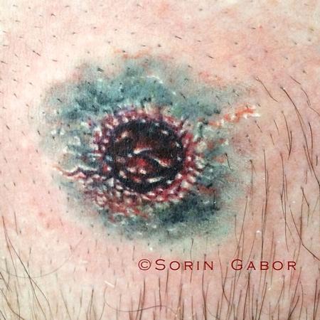 Tattoos - realistic color bullet hole tattoo on chest- entry wound - 93785